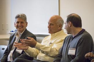 Illinois Computer Science Alumni Award winners, from left, David Lassner, Douglas MacGregor, and Ross Erlebacher talk before the Oct. 19 panel discussion 