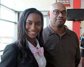 Urbana High School student Aja Capel with her father, Parrish Capel.