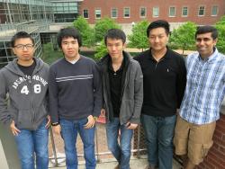 The Illinois team going to the ICPC World Finals (from left): Jingbo Shang (assistant coach), Lan Dao, Siwakorn (Ping) Srisakaokul, Xin (Victor) Gao, and Uttam Thakore (coach).