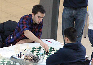 CS-Math freshman Eric Rosen (left) makes a move during the Pan-American Intercollegiate Championship for chess. The Illini Chess Club won the right to compete in the President's Cup, known as the Final Four for chess.