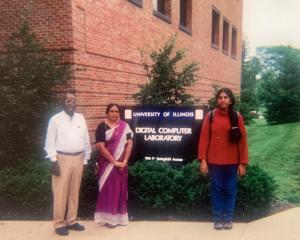 Shobana Radhakrishnan (right) and her parents outside of the Digital Computer Laboratory.