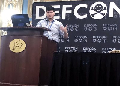 Vivek Nair, pictured here at DEF CON, dedicates himself to cybersecurity research.