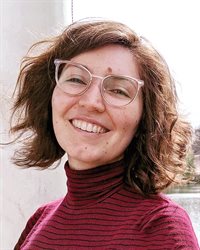 Headshot of Illinois CS professor Katie Cunningham, pictured in an outdoor setting.