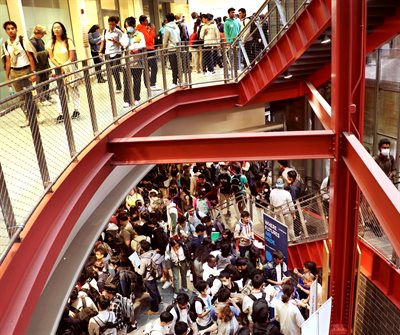 Students fill two levels of the Thomas M. Siebel Center for Computer Science to attend the After Hours event.