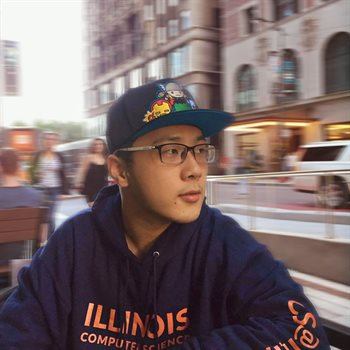 Image of Illinois CS alumnus Bo Chen with a scenic city backdrop.