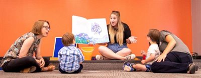 The University at Buffalo has partnered with GiGiâ€™s Playhouse Down Syndrome Achievement Center of Buffalo to provide UB students with in-classroom experience teaching students with disabilities. UB students were photographed at the center working with clients in July 2021.