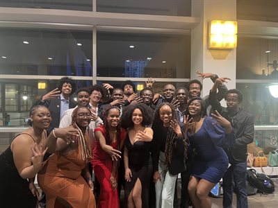 Hadgu, back left, pictured at the NSBE National Convention last week with his fellow members from UIUC. They are throwing up fours to represent Illinois as part of the Midwest Region, or Region IV.