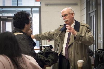 Illinois CS alumnus Scott Fisher talks to students outside a class during a February visit. Fisher has agreed to extend his support of the Scott H. Fisher Computer Science Teaching Award.